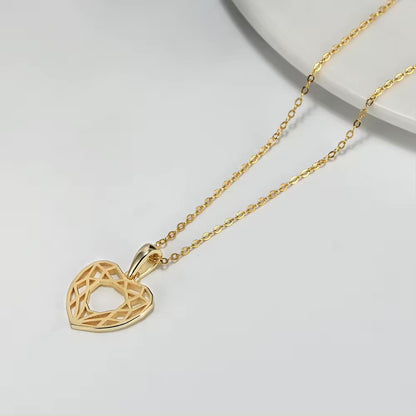 Geometric gold heart pendant 