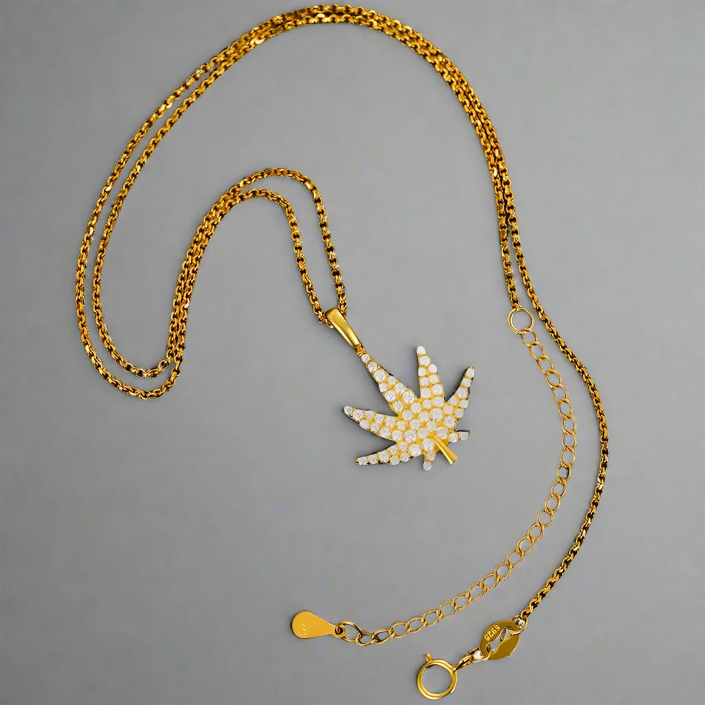 iced out Gold marijuana pendant