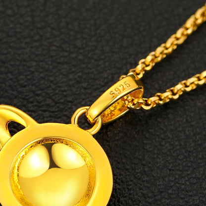 iced out gold Saturn pendant 