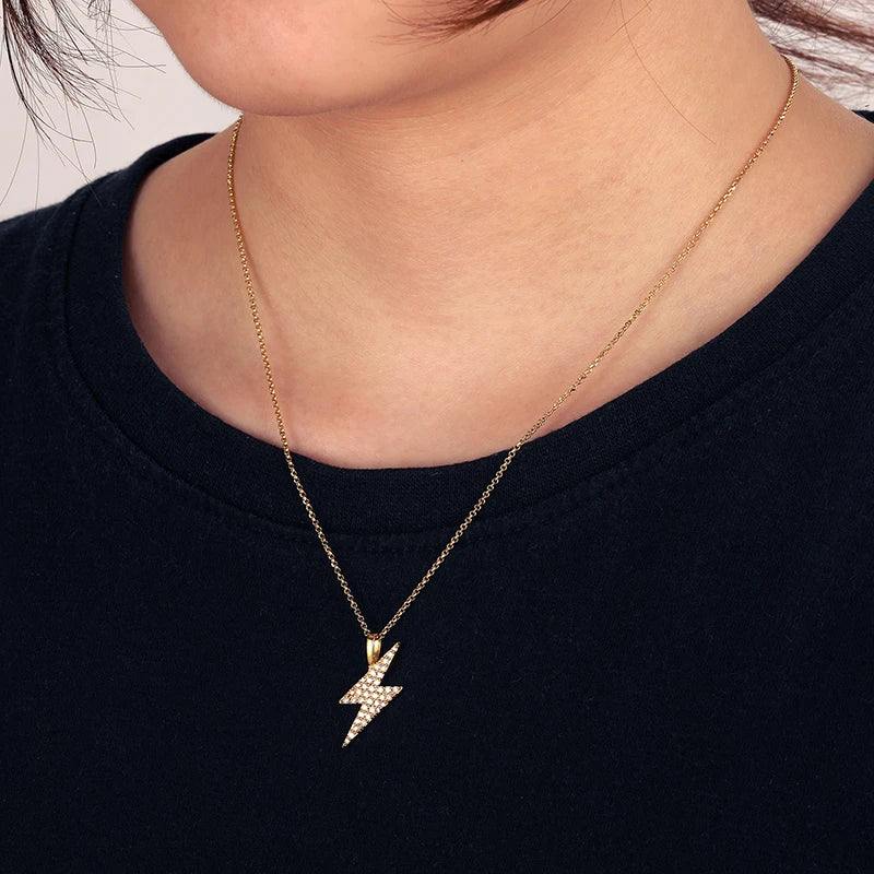 iced out gold lightning pendant 