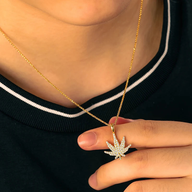 iced out gold marijuana pendant